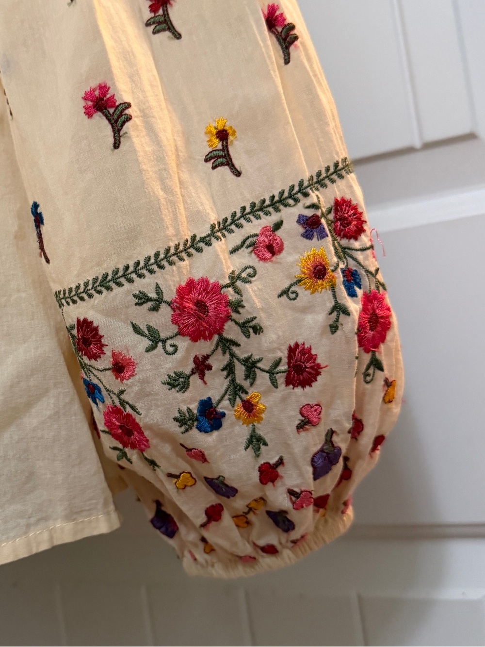 Cream Embroidered Peasant Blouse with Colorful Floral Detail - Picture 5 of 17